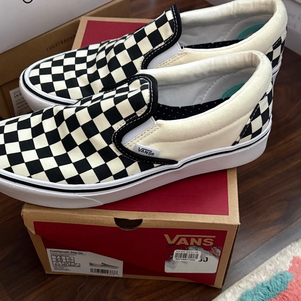 Vans Black and White Checkerboard Slip-Ons